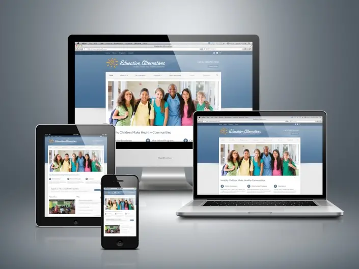Website design by Matthew McWilliam shown on a desktop monitor, laptop, tablet and phone — design 12 of 17